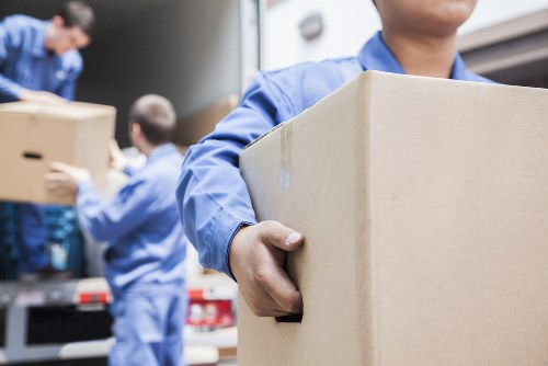 Office relocation planning in Leyton with moving boxes and furniture