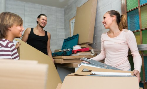 House movers working in a Leyton residential street