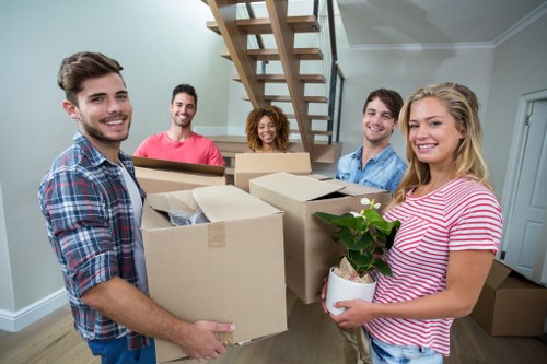 Packing boxes and furniture ready for a Leyton home removal