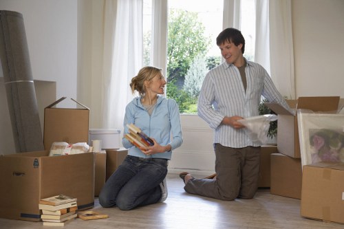 Packed moving boxes and furniture ready for transport