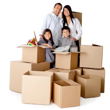 Careful loading of boxes and furniture into a removals van in Leyton
